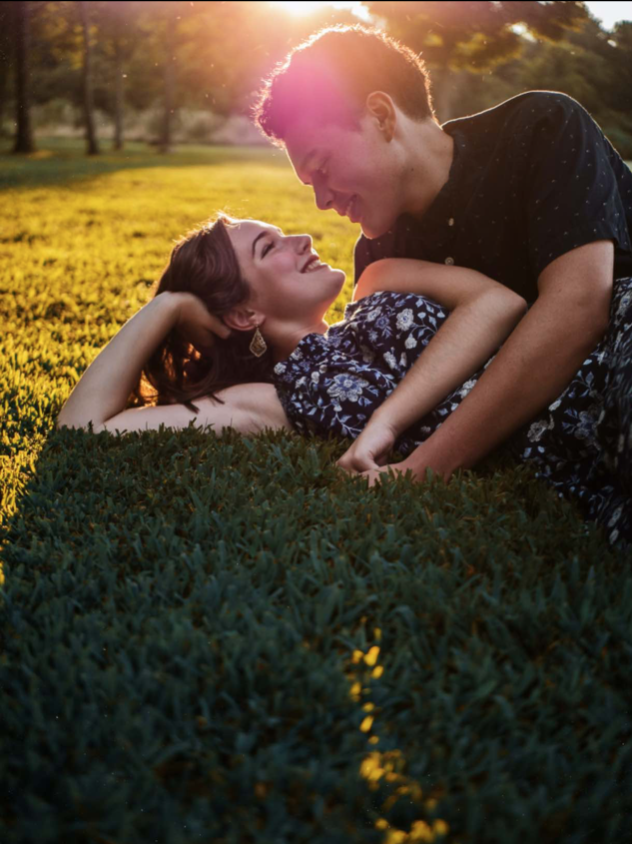 Happy couple, lying in the grass